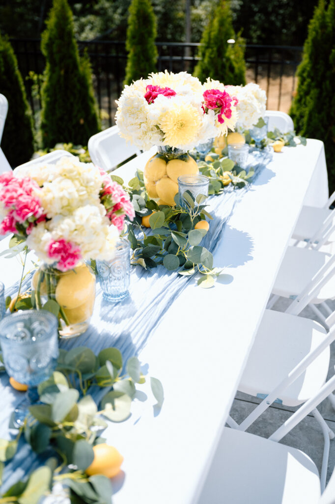 Lemon-themed first birthday party setup with soft blues and white in Louisville KY