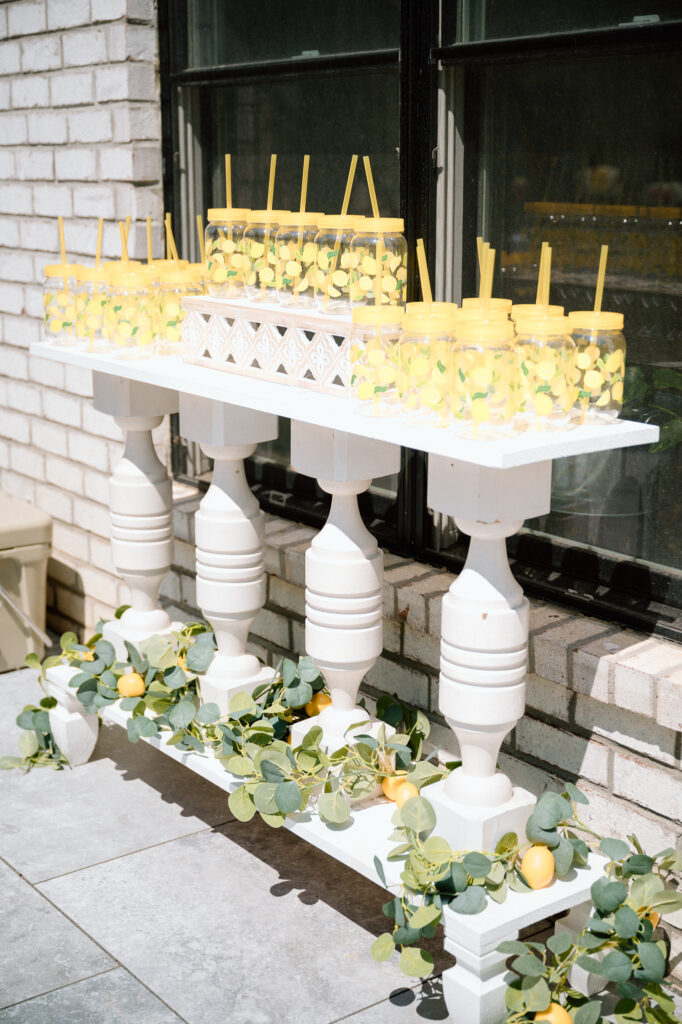 Lemon-themed first birthday party setup with soft blues and white in Louisville KY