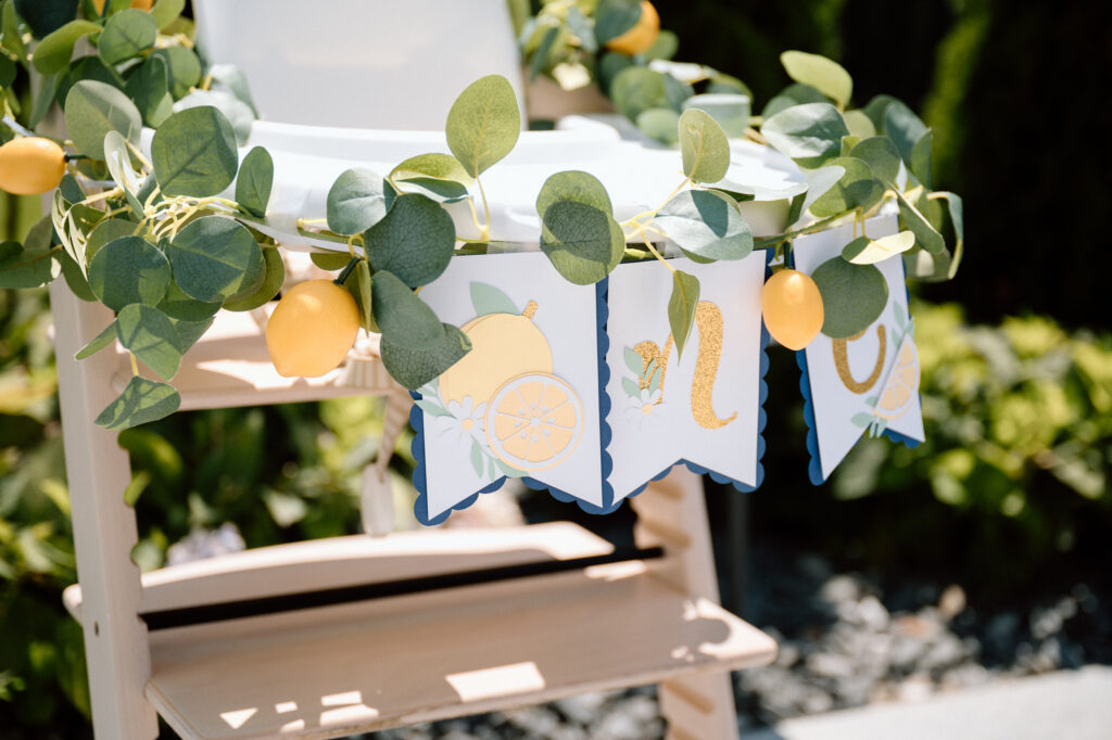 Lemon-themed first birthday party setup with soft blues and white in Louisville KY