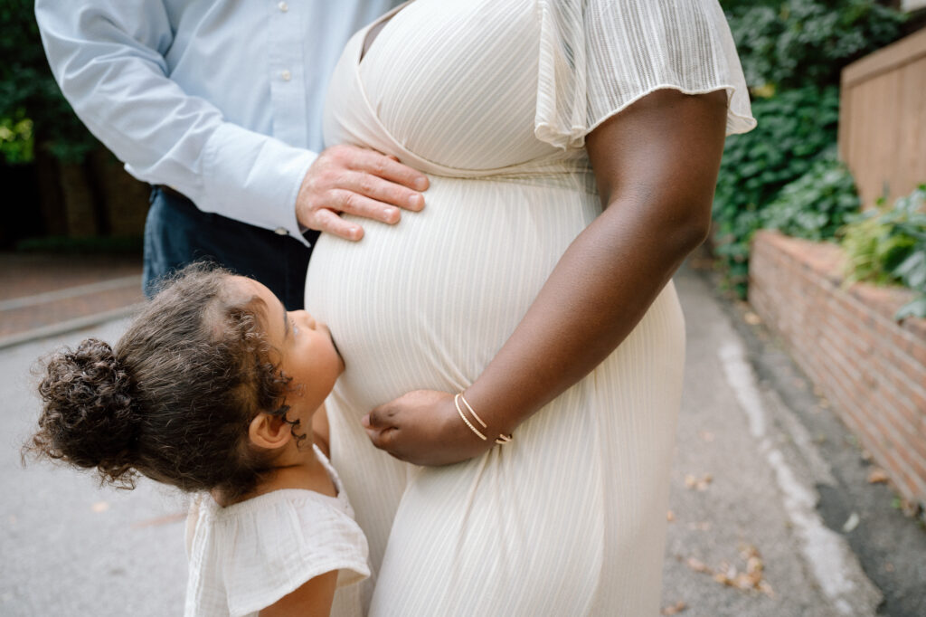 Family of four during outdoor maternity session in Kentucky
