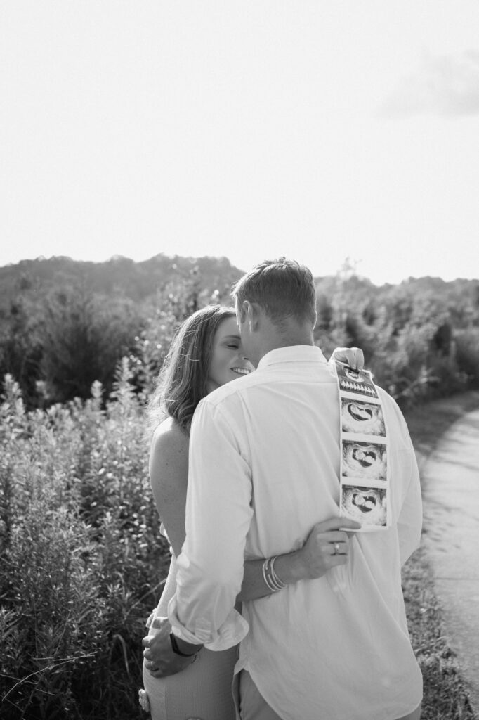 Louisville KY couple shares joyful pregnancy moment during announcement shoot
