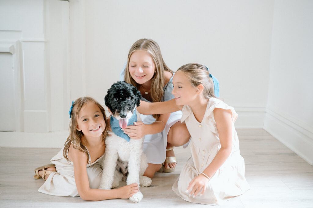 Family with dog during studio portrait session in Lexington KY