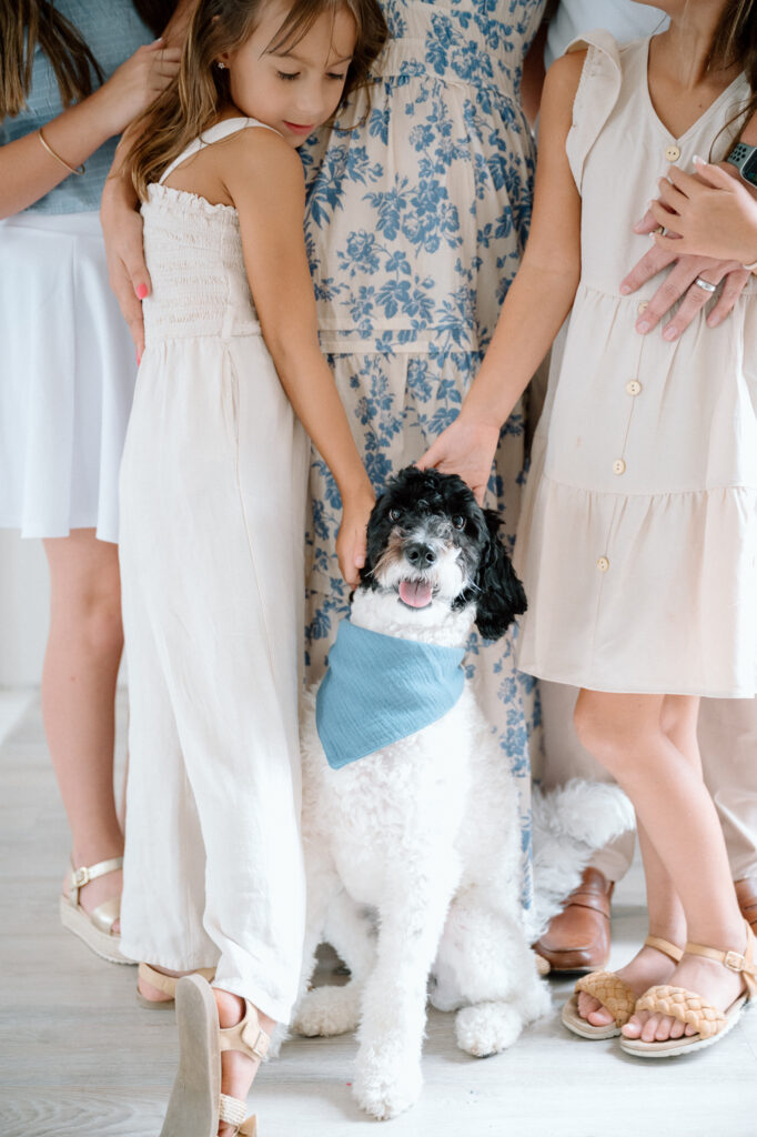 Candid family portrait with dog in Lexington KY photography studio