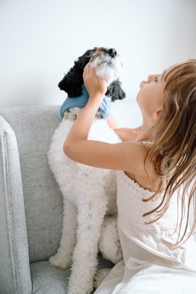 Candid family portrait with dog in Lexington KY photography studio