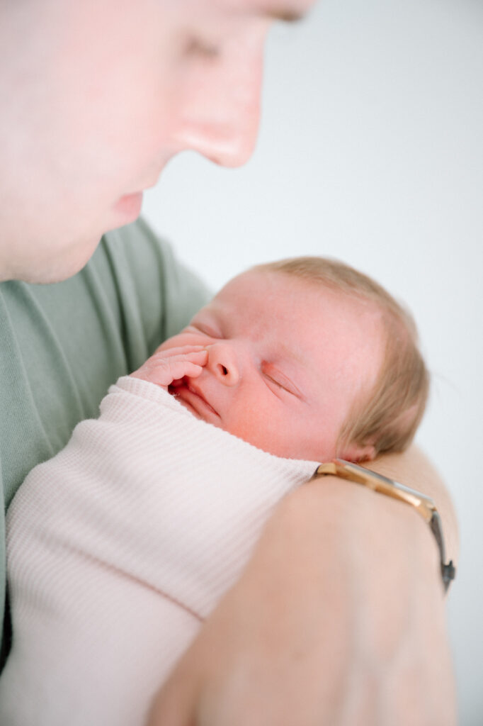 Newborn baby swaddled
