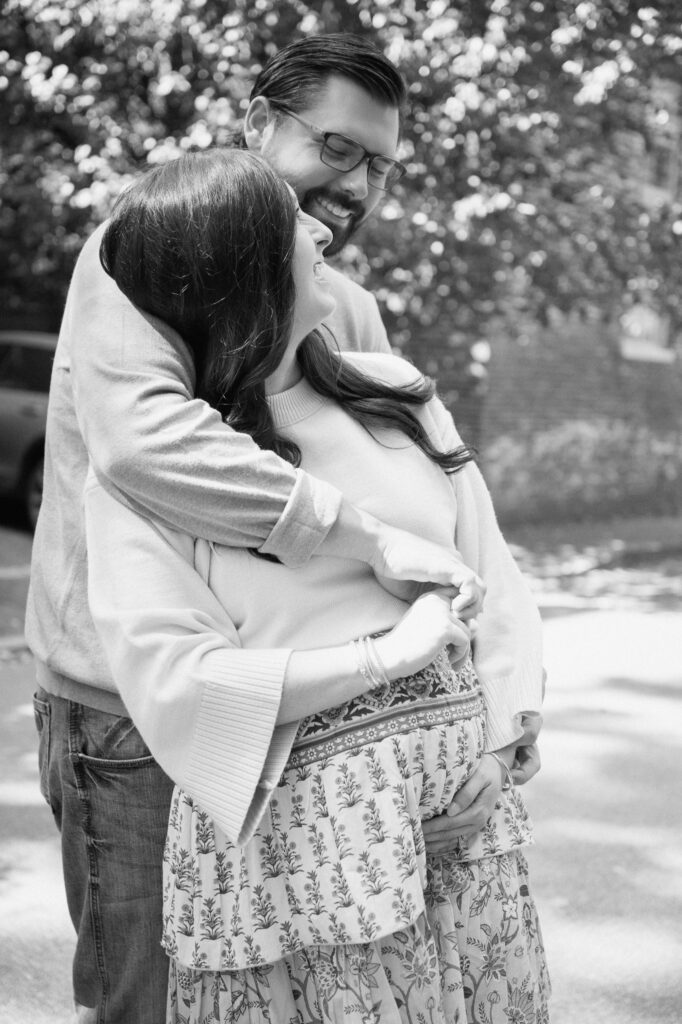Expecting parents walking together during maternity session at Gratz Park Lexington