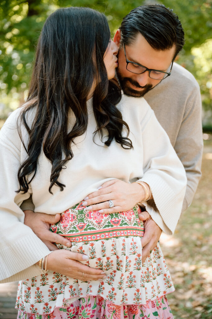 Expecting parents walking together during maternity session at Gratz Park Lexington