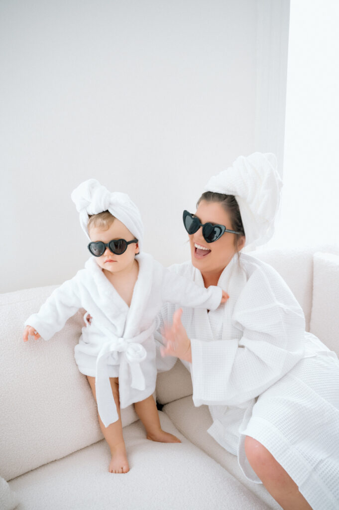 one year old girl wearing cute sunglasses during mommy and me photo session