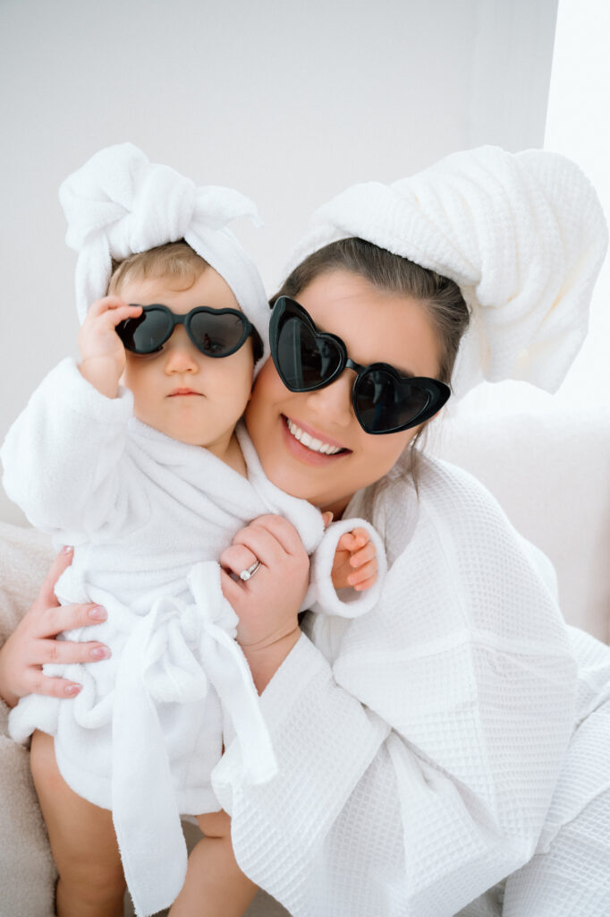 one year old girl wearing cute sunglasses during mommy and me photo session