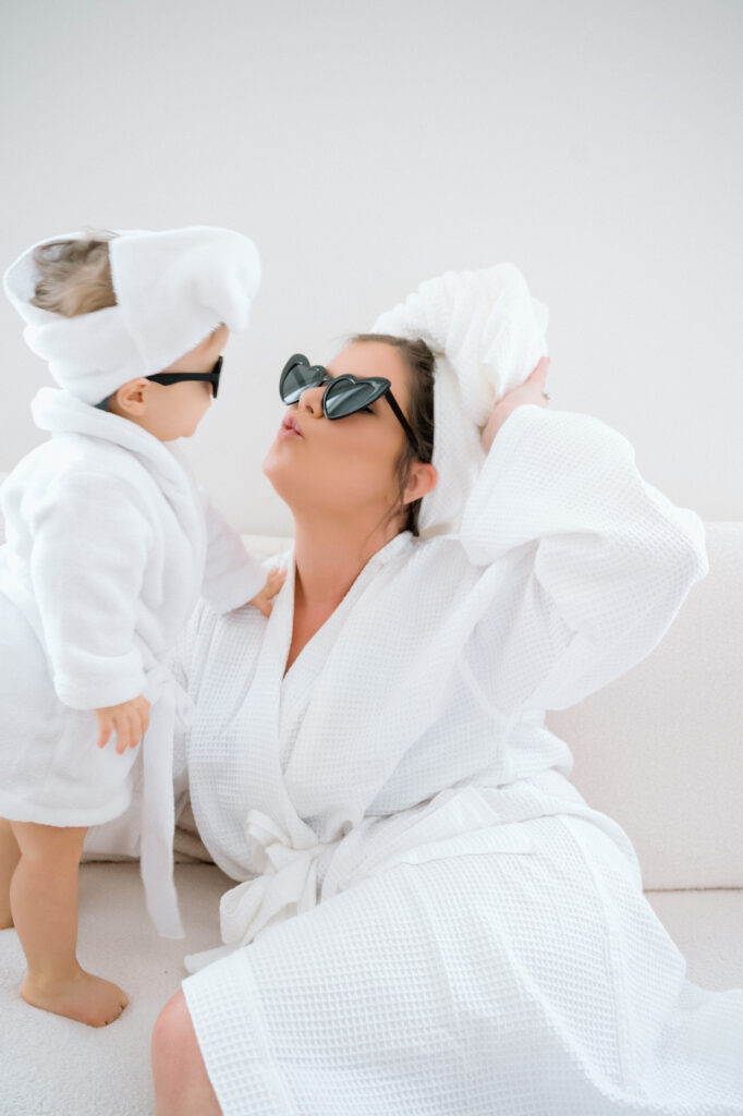 one year old girl wearing cute sunglasses during mommy and me photo session
